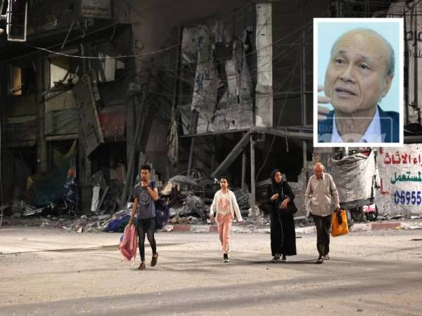 Sebuah keluarga Palestin terpaksa meninggalkan kediaman mereka di timur Bandar Gaza selepas kempen serangan udara rejim Zionis semakin meningkat. - AFP (Gambar kecil: Lee Lam Thye)