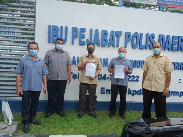 Jamani (tengah) tampil membuat laporan polis di IPD Kota Setar pada Isnin.