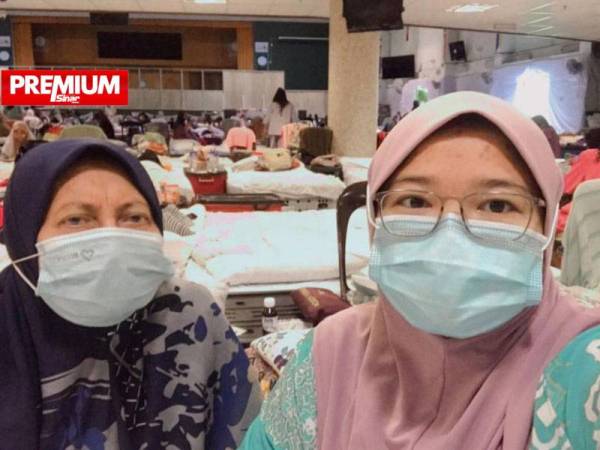 Wan Norfamin (kanan) bersama ibunya, Nik Siti Fatimah kini ditempatkan di PKRC Pusat Tarbiah Islamiah Kelantan di Pengkalan Chepa.