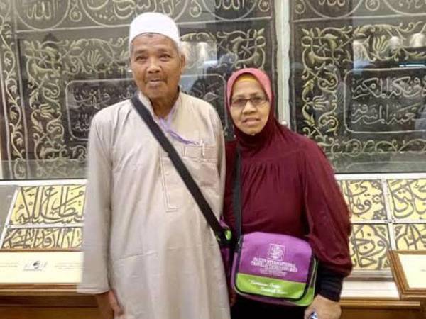 Allahyarham Abdul Hamid (kiri) yang mencarum melalui Perkeso telah membantu membela nasib ahli keluarganya yang ditinggalkan.