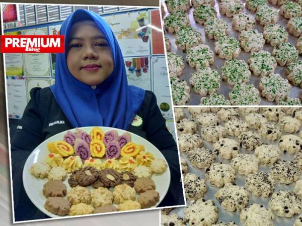 Erni menunjukkan antara kuih bangkit yang dipasarkan oleh syarikatnya.