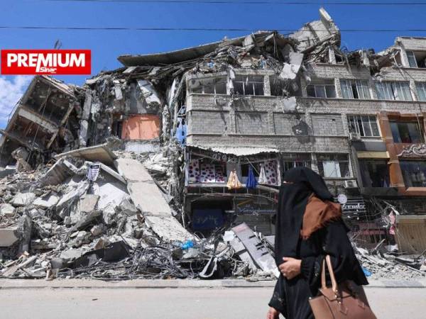 Sebuah bangunan musnah akibat serangan Tentera Udara Israel yang berlaku di Gaza pada bulan lalu. - Foto AFP