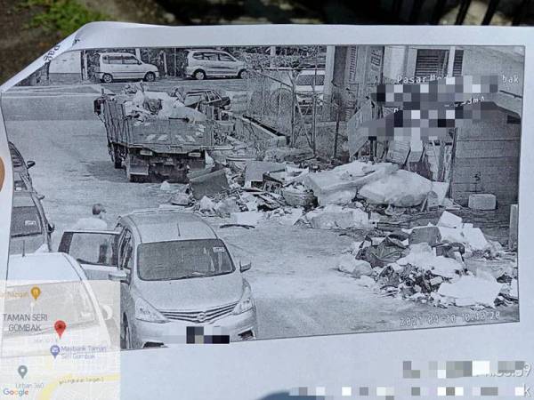 Rakaman CCTV memaparkan perbuatan individu membuang sampah secara haram.