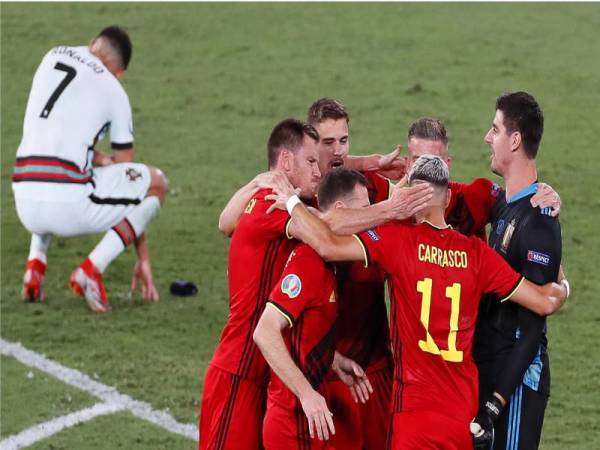 Pemain Belgium meraikan kejayaan menundukkan Portugal pada aksi 16 pasukan terakhir pada awal pagi Isnin.