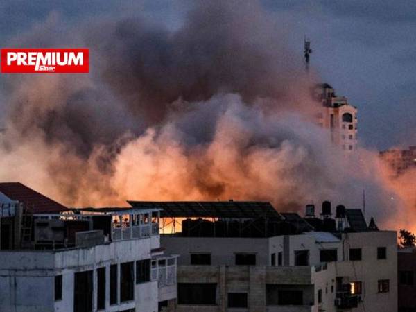 Tentera rejim Zionis dituduh melakukan jenayah perang kerana menyerang bangunan-bangunan awam dalam serangan udara ke atas Gaza selama 11 hari pada bulan Mei lalu. - Foto AFP