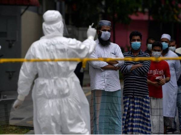 Kerajaan disaran melaksanakan ujian saringan secara besar-besaran terhadap semua orang termasuk pekerja asing dan pekerja asing tanpa izin semasa PKPD. - Gambar hiasan 