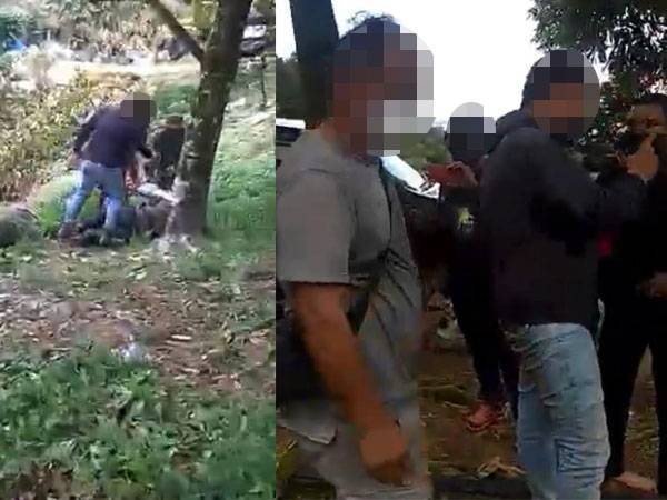 Tangkap layar klip video yang memaparkan beberapa individu melakukan provokasi terhadap anggota operasi tersebut.
