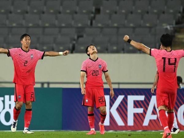 Won-sang meraikan jaringan penyamaan ketika aksi persahabatan menentang Argentina di Yongin. -Foto AFP