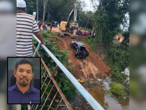 Kenderaan jenis pacuan empat roda Ford Ranger milik Abdullah dibawa naik selepas terjunam ke dalam sungai. - Gambar Ihsan Pembaca (Mangsa Abdullah Derahman)