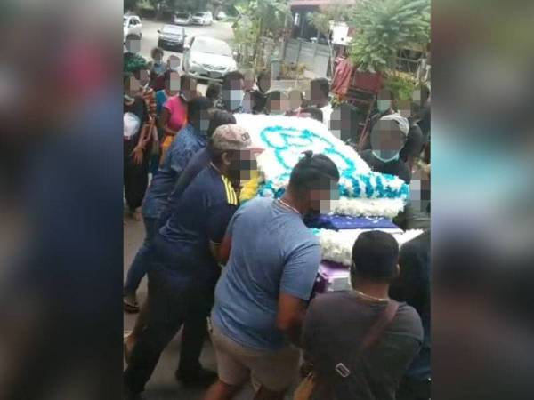 Tular rakaman video memaparkan keranda tertera lambang kumpulan kongsi gelap ketika mengusung mayat seorang lelaki di Durian Tunggal, Alor Gajah pada Rabu lalu.