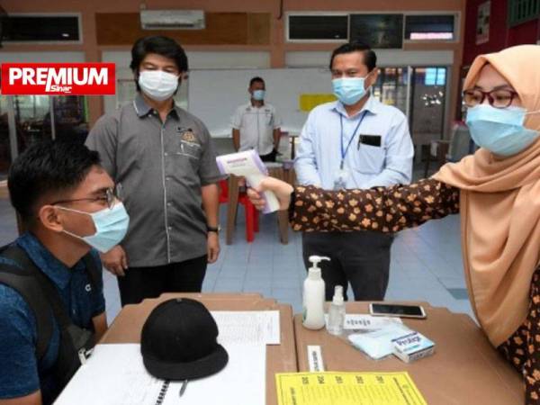 Segelintir guru menyatakan kebimbangan untuk memulakan sesi persekolahan secara bersemuka memandangkan kes positif Covid-19 masih tidak menentu. - Gambar hiasan