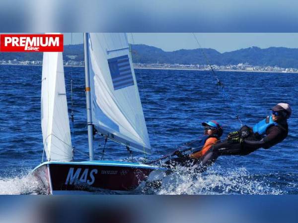 Juni dan Nuraisyah ketika menjalani latihan di Enoshima Yacht Harbour baru-baru ini. Foto: Majlis Sukan Negara