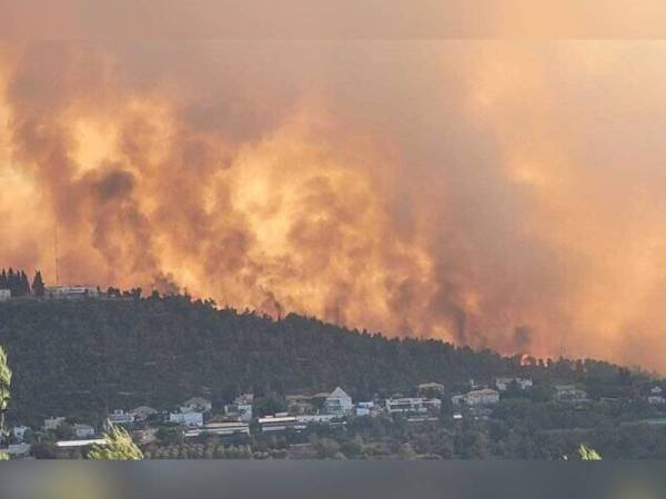 Kebakaran hutan yang berlaku di barat Baitulmaqdis pada Ahad. - Foto: Ariel Kedem/Pihak Berkuasa Taman dan Alam Semula Jadi Israel.