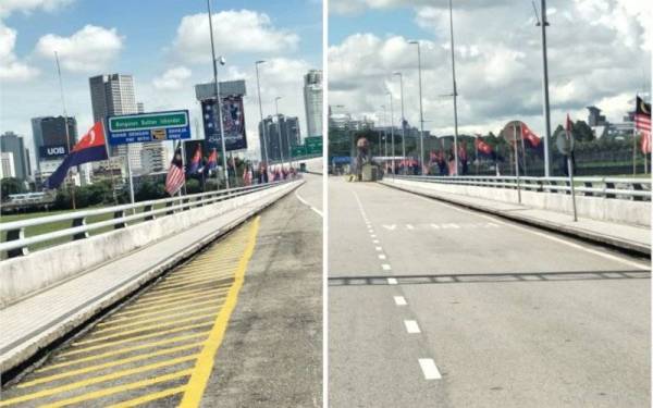 Tambak Johor dihiasi dengan Jalur Gemilang dan Bendera Johor sempena bulan kemerdekaan.