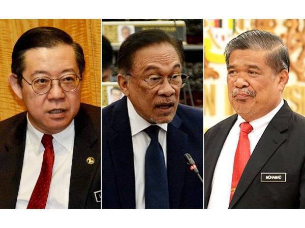 Dari kiri Guan Eng, Anwar dan Mohamad.