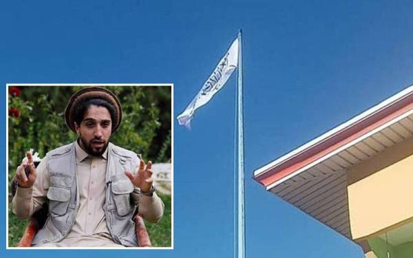 Bendera gerakan Taliban dikibarkan di luar pejabat gabenor di daerah Annaba di Lembah Panjshir. Gambar kecil: Ahmad Massoud. - Foto: Agensi Gambar kecil: Ahmad