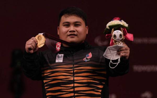 Bonnie meraih pingat emas pertama negara bagi kategori 72kg pada Sukan Paralimpik Tokyo 2020 di Tokyo International Forum, 28 Ogos lalu. 