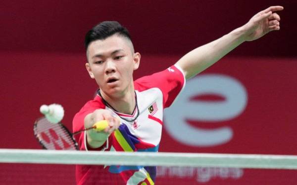 Lee Zii tewas straight set 15-21, 17-21 kepada Ginting dalam perlawanan suku akhir Piala Thomas. - Foto EPA