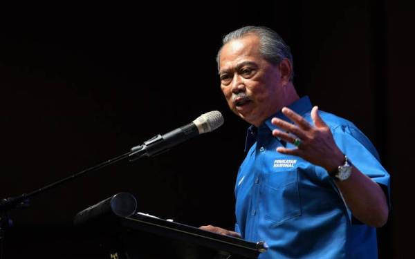 Muhyiddin menyampaikan ucapan pada majlis Makan Tengah Hari PN pada Khamis. - Foto Bernama