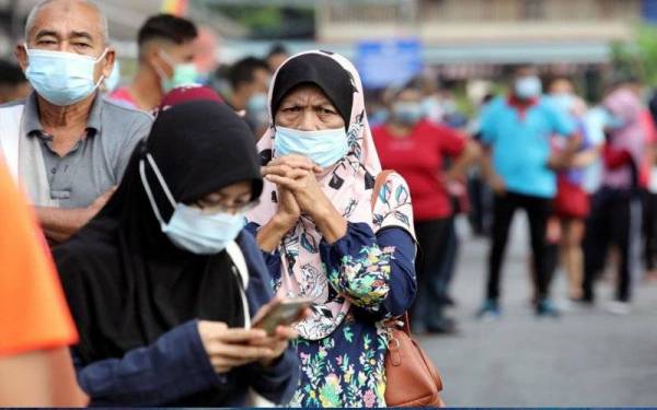 ASEAN bimbang dengan akibat dan kesengsaraan yang berterusan serta gangguan yang teruk dialami masyarakat dan ekonomi, serta kesan buruk terhadap kehidupan dan mata pencarian rakyat, disebabkan Covid-19. Foto Reuters