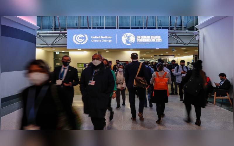 Hampir 200 negara yang mengambil bahagian menerima pakai Perjanjian Iklim Glasgow pada akhir sesi ke-26 Persidangan COP26. Foto Xinhua