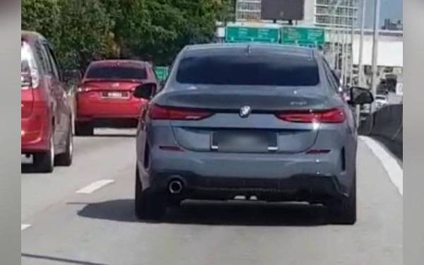 Kenderaan mewah jenis BMW yang dirakam menggunakan nombor pendaftaran 'fancy' dalam satu klip video yang tular di media sosial.