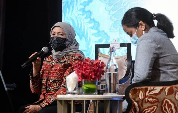 Datuk Seri Nancy Shukri (left) speaking during High Level Panel session at the World Tourism Organization (UNWTO) Regional Conference on the Empowerment of in Tourism in Asia and the Pacific today. (Photo by Bernama)