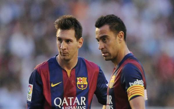 Messi dan Xavi ketika bersama Barcelona