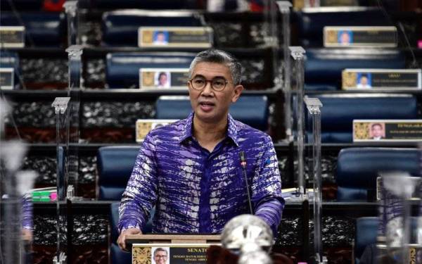 Tengku Zafrul pada Mesyuarat Khas Penggal Ketiga Parlimen Ke-14 di Bangunan Parlimen pada Khamis. - Foto Bernama 