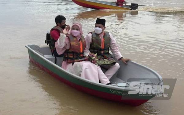 Faizuan bersama pasangannya, Nora Amira memilih persandingan secara unik itu kerana pemandangan indah berlatar Sungai Pahang.