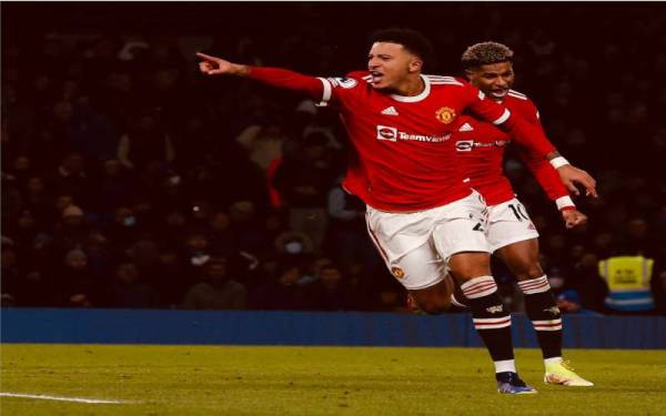 Sancho meledak jaringan pembukaan untuk Manchester United di Stamford Bridge. - Foto Manchester United.