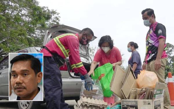 Aktiviti penjualan barangan kitar semula yang dianjurkan SWCorp menjadi faktor penurunan kes denggi di daerah Kuantan. Gambar kecil: Hamdan