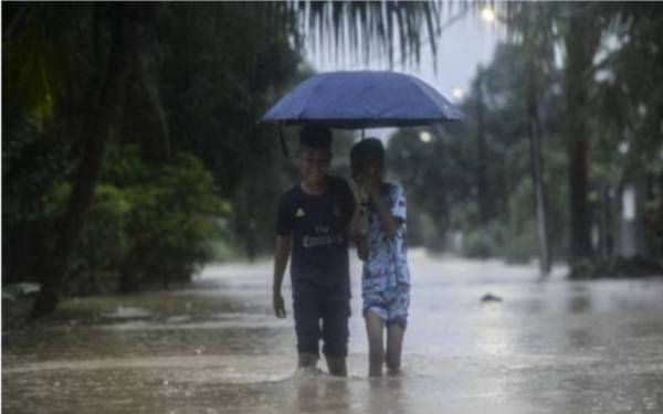 Hujan lebat telah menyebabkan banjir di lima wilayah di selatan Thailand. - Foto Bernama
