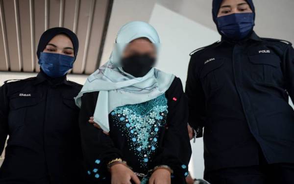 Seorang ibu berusia 24 tahun didakwa di Mahkamah Sesyen hari ini, atas pertuduhan mengabaikan anak lelakinya berusia lima tahun tujuh bulan yang maut selepas terjatuh dari tingkat 16 di sebuah kondominium November lepas. - Foto Bernama
