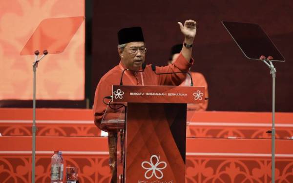 Muhyiddin ketika menyampaikan ucapan perasmian di Perhimpunan Agung Tahunan Bersatu di Pusat Pameran dan Dagangan Antarabangsa Malaysia hari ini. - Foto Bernama