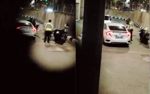 Klip video berdurasi dua minit 51 saat memaparkan dua anggota polis sedang menahan seorang lelaki yang memandu sebuah kereta jenis Honda dan enggan memberikan kerjasama tular di Facebook pada Ahad.