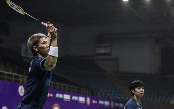 Aksi Tan Jie (kiri) dan Yen Wei pada final Terbuka India 2022, pada Ahad. - Foto BAM