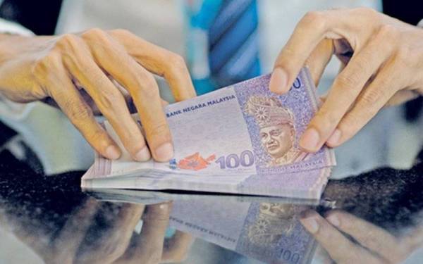 Nilai ringgit kembali pulih dan dibuka lebih tinggi berbanding dolar AS pada urus niaga pagi Khamis. - Gambar hiasan