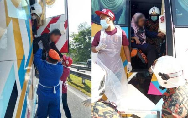 Anggota Angkatan Pertahanan Awam (APM) dan anggota bomba dari BBP Temerloh membantu mengeluarkan penumpang selepas bas dinaiki merempuh belakang sebuah treler di Kilometer 132.5 LPT1 dekat Temerloh pada petang Ahad.