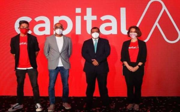 (Dari kiri) Presiden Komersial Capital A, Colin Currie; Presiden (Penerbangan)& Ketua Pegawai Kumpulan AirAsia Aviation Limited, Bo Lingam; Fernandes; dan Presiden (Venture) Aireen Omar.