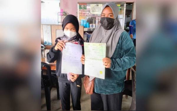 Noratikah (kanan) berharap dapat mengesan ibu kandung Nur Alya Azmina Lyana bagi membolehkan proses permohonan kad pengenalan berjalan mengikut prosedur ditetapkan.