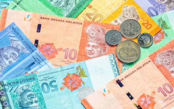 Ringgit kekal kukuh berbanding dolar AS untuk hari ketiga berturut-turut pada Khamis. - Gambar hiasan