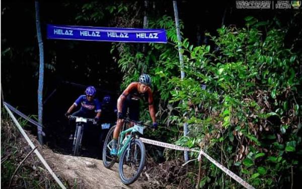 Aksi Fauzan ketika menjuarai Terbuka Lelaki Elit Helaz Kenjoh XCO 2.0 Challenge di Dungun pada Ahad.