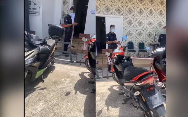 Tangkap layar video tular memaparkan dua anggota polis menjalankan pemantauan prosedur operasi standard (SOP) solat Jumaat di sebuah masjid di Puchong di sini, pada Jumaat.