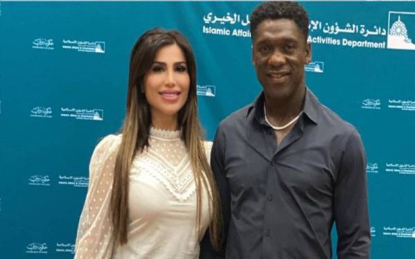 Seedorf bersama isterinya, Sophia Makramati.