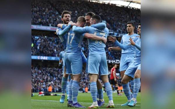 Pemain Manchester City meraikan kemenangan 4-1 ke atas Manchester United pada Isnin. - Foto Sports Illustrated