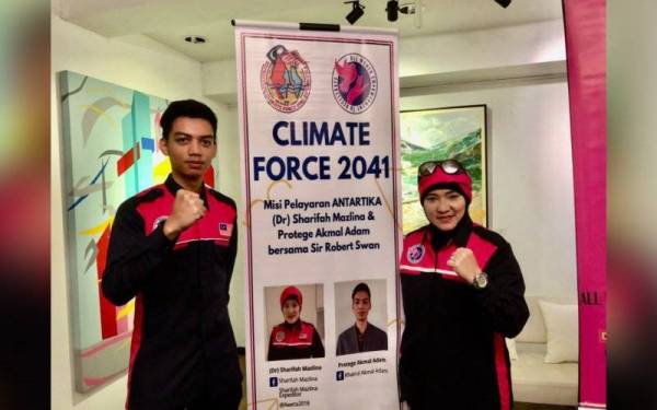 Muhammad Khairul Akmal (kiri) bersama Sharifah Mazlina ketika sidang akhbar misi pelayaran CF2041 di Kuala Lumpur pada Isnin.