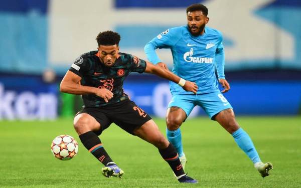 James ketika bersaing dengan pemain Zenit St. Petersburg, Wendel semasa aksi perimhlat kumpulan H Liga Juara-Juara pada 8 Disember lalu. FOTO: AFP