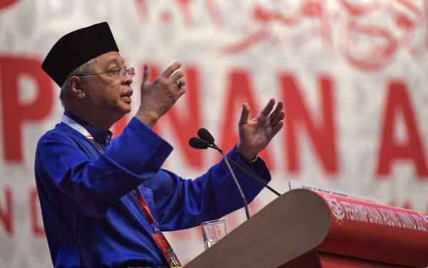 Ismail Sabri menyampaikan ucapan penggulungan pada Perhimpunan Agung UMNO (PAU) 2021 di Dewan Merdeka, Pusat Dagangan Dunia Kuala Lumpur pada Sabtu. - Foto Bernama