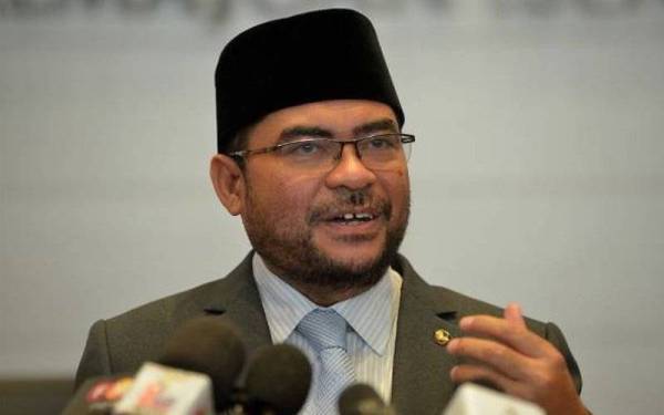 Dr Mujahid